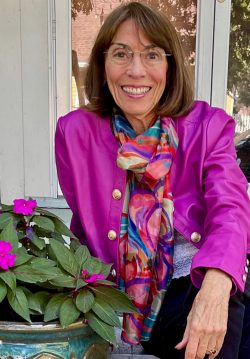 Jean Schumaker with flowers